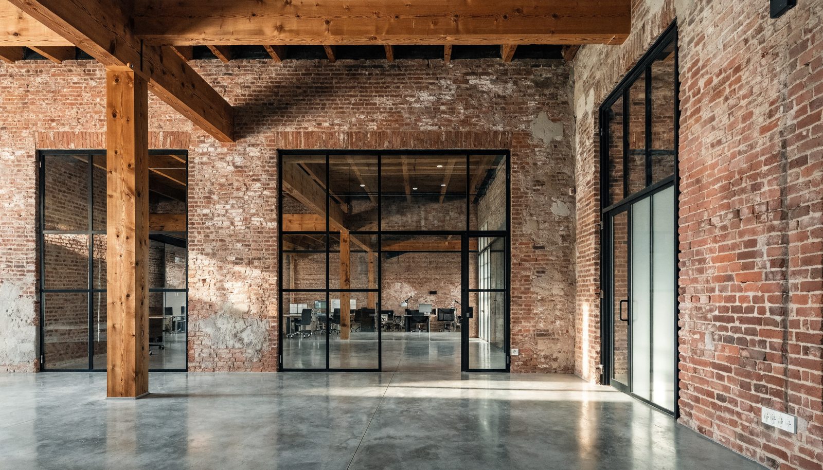 Restored brick-and-beam interior after completion